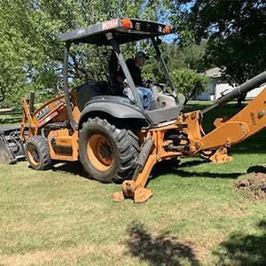 Digging with a backhoe